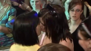Tongue kissing at the party
